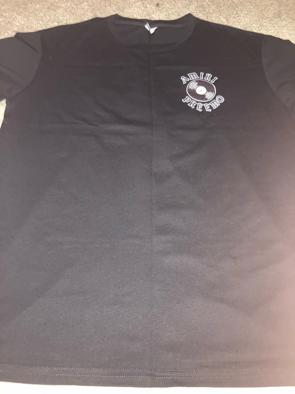 AMIRI Black Tee with White Vinyl Chest Graphic